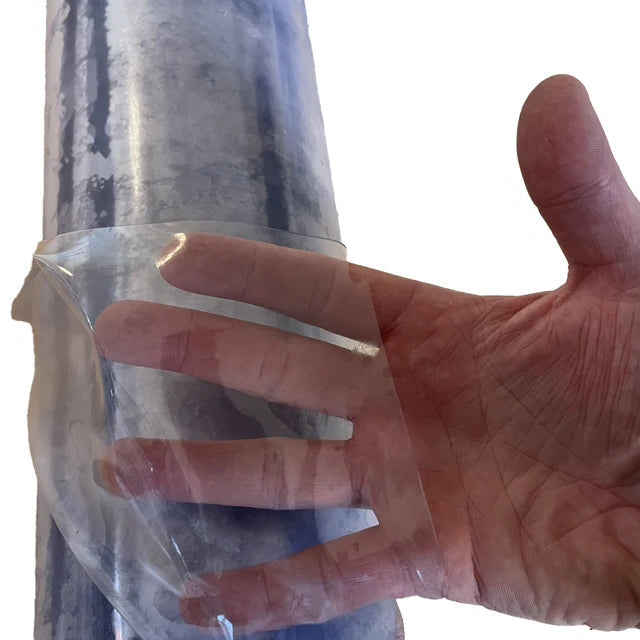 Roll of high-quality transparent glass, 1.1m x 25m, suitable for windows or panels.