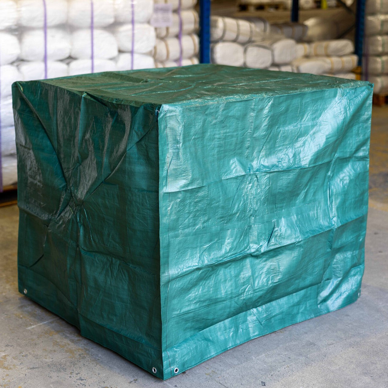 Close-up of 140gsm pallet cover used for shielding products on pallets.