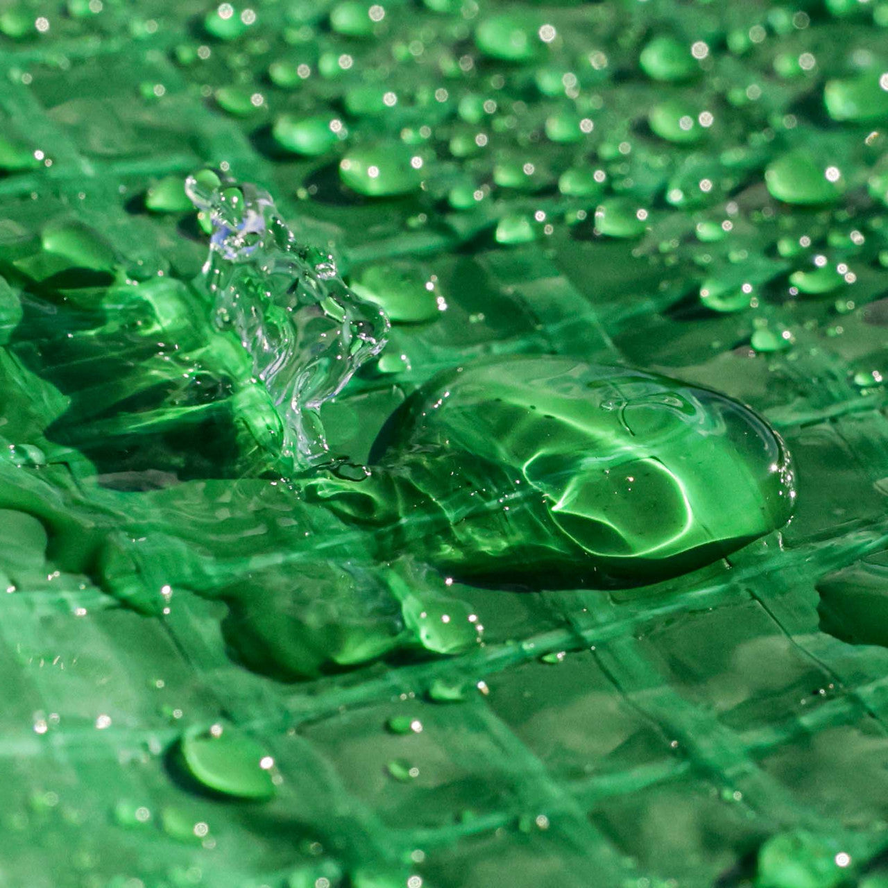 170gsm waterproof mono cover green tarpaulin for outdoor and industrial applications.