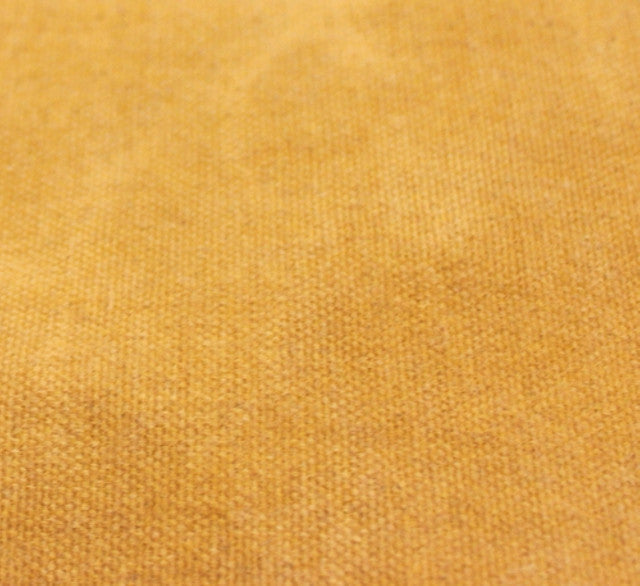 Close-up of 18oz cotton canvas tarpaulin spread out for surface protection