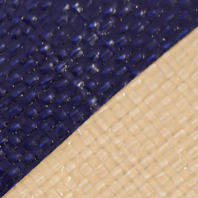 Close-up of 350gsm heavy-weight tarpaulin in blue and beige for covering surfaces.