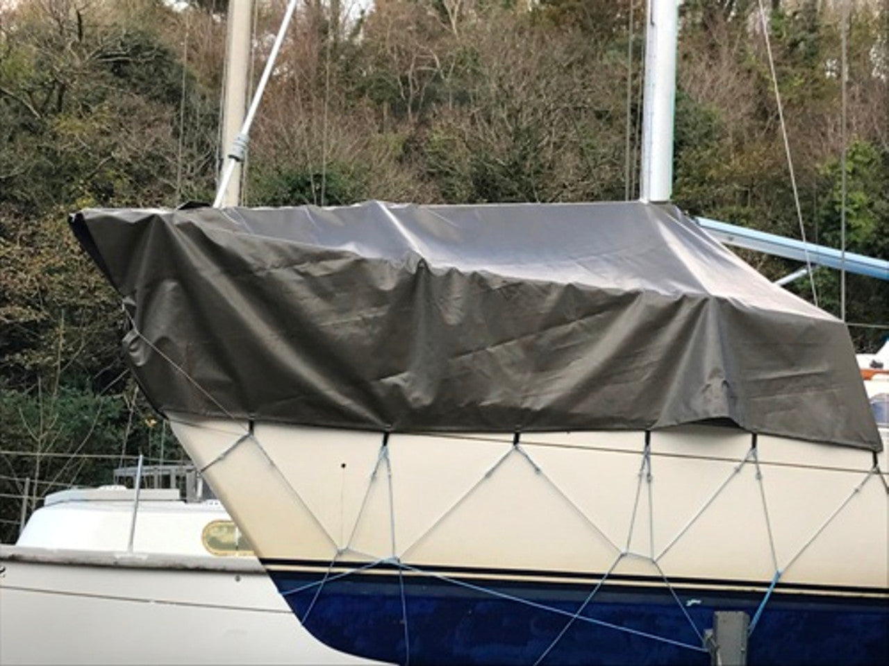 Industrial-grade 560gsm PVC tarpaulin for covering materials and equipment safely.