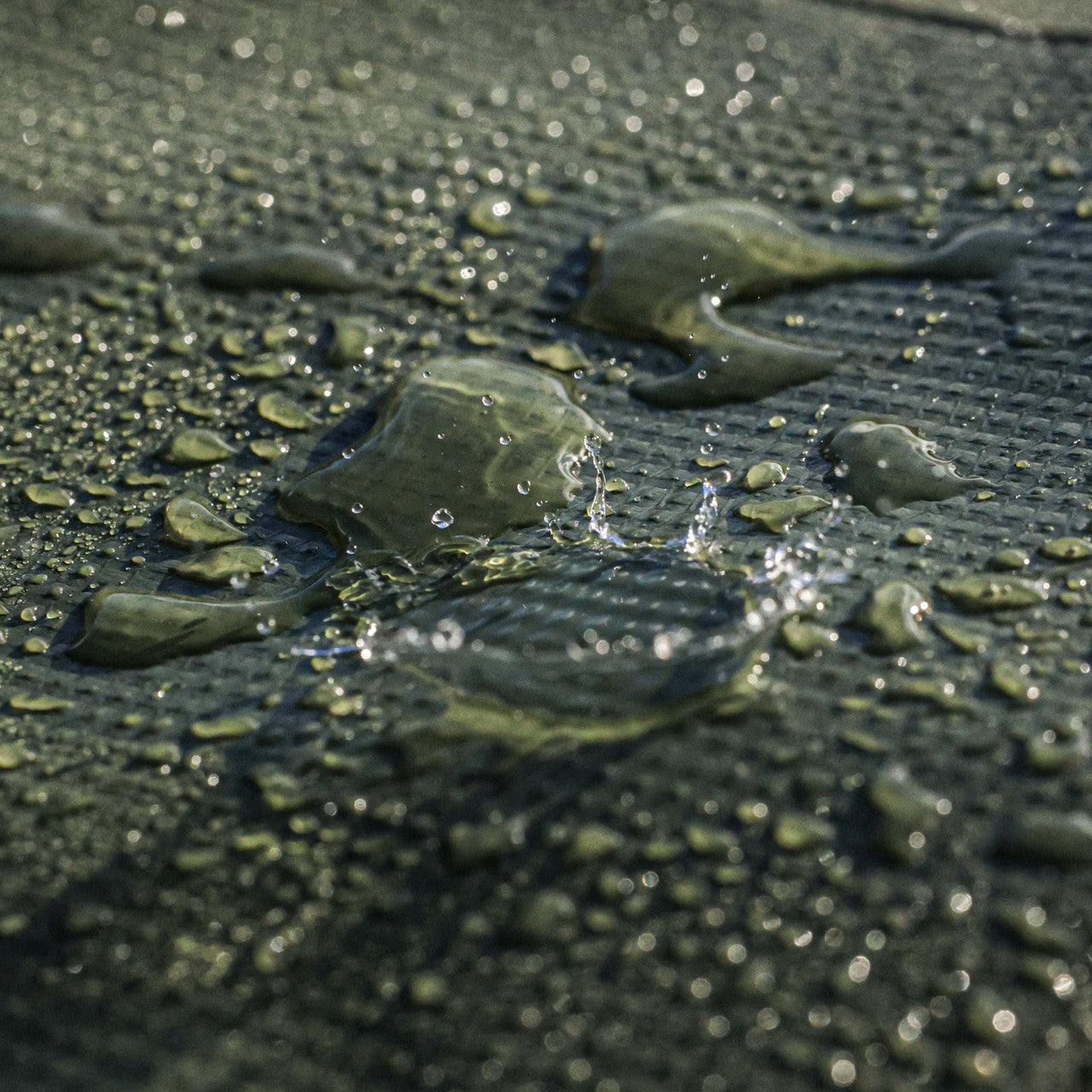 Waterproof 560gsm extra heavy PVC tarpaulin used for industrial and outdoor protection.