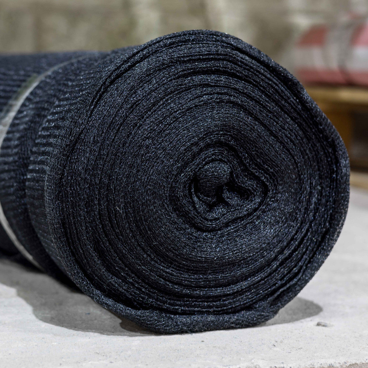 Lightweight 70gsm debris netting for scaffolds, roofs, and material containment.