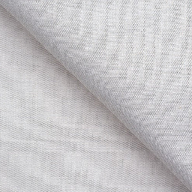 Cotton calico dust sheet protecting furniture and floors from paint and debris.