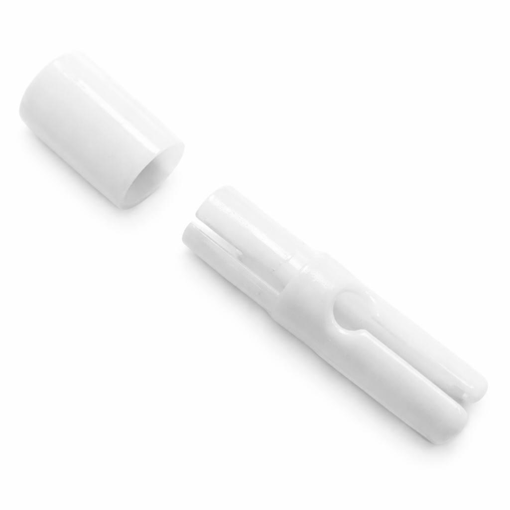 Single white autolocking toggle for securing cords, ropes, or drawstrings.
